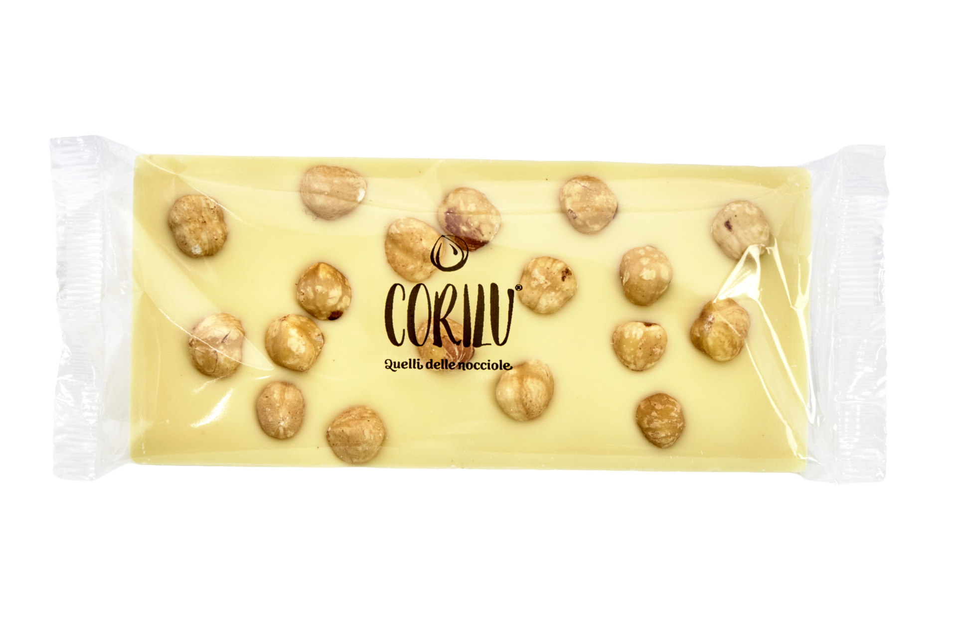 Corilù_Bianco_J0A6861 La Tavoletta di Cioccolato Bianco e Nocciole 100g unisce la dolcezza avvolgente del cioccolato bianco alla personalità intensa e fragrante della Nocciola Piemonte IGP, creando un equilibrio ricco.